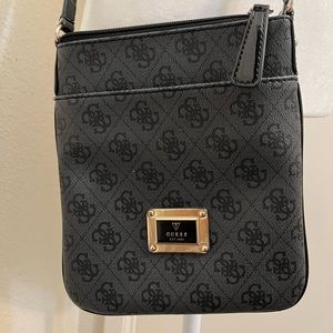 Lightly used Guess Crossbody charcoal grey and black